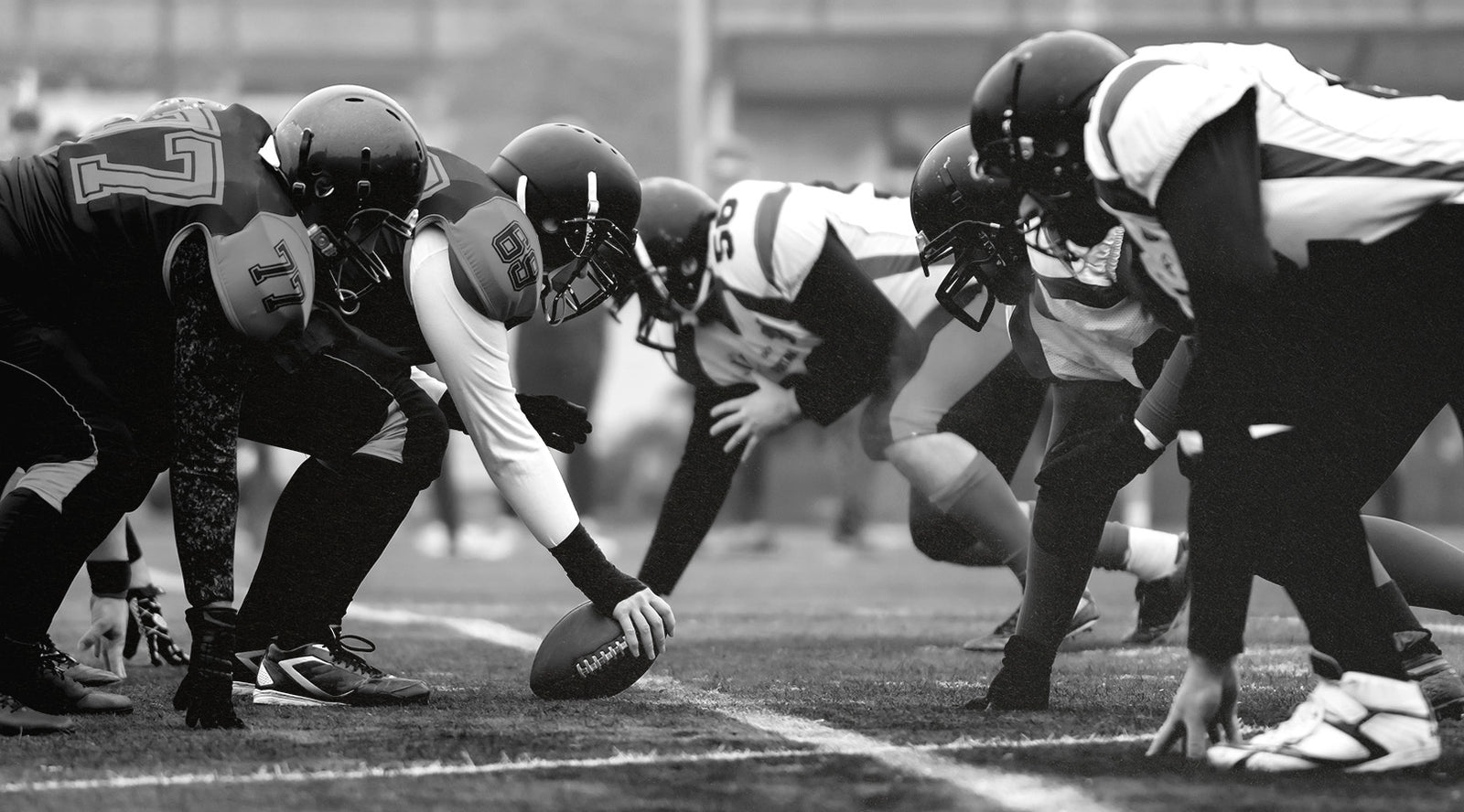 Football Players at the Line of Scrimmage